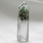 Clear quartz with chlorite phantoms and rutile